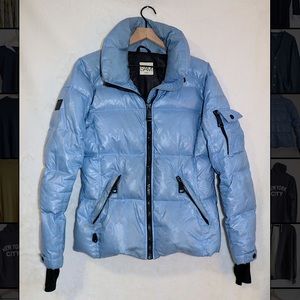 SAM puffer jacket with thumb holes.